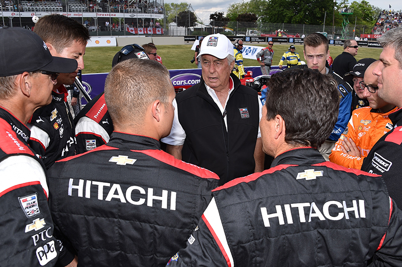 Pep Talk - Roger Penske offers words of encouragement to his race team prior to the 2016 Detroit Grand Prix, won by Team Penske’s Will Power. // Courtesy of LAT USA
