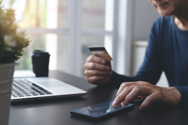 Man using banking software