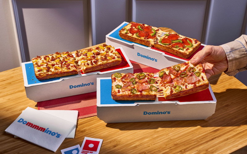 Domino’s Pizza is launching the Domino, Detroit-style for one, shaped like the company’s logo.