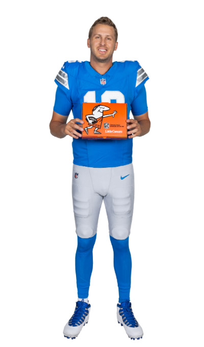 Jared Goff posing with a Little Caesars box