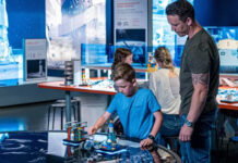 Artemis Adventure with LEGO Bricks Coming to The Henry Ford in Dearborn A child working on a project as an adult supervises.