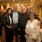 Annemarie and Jim Proctor, Msgr. Chuck Kosanke, Enrica Rugiero