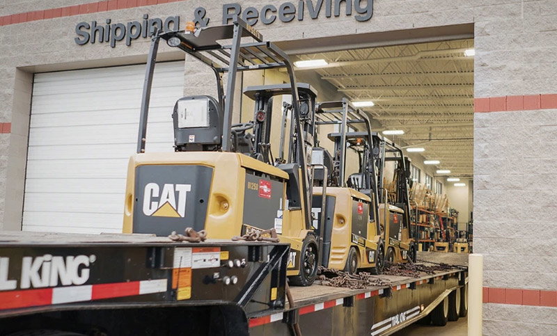 CAT equipment in a warehouse