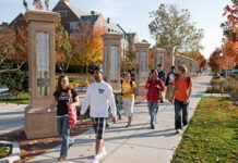 Michigan State University Enrollment Surpasses 50,000 Students in 2026 Students walking through the Michigan State University campus.