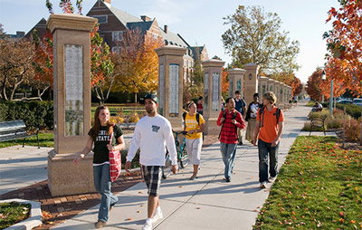 Students walking through the Michigan State University campus.
