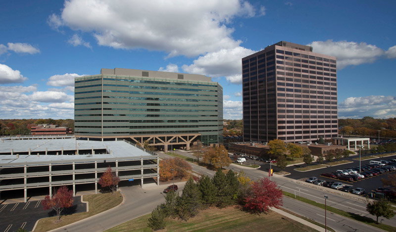 AT&T has signed a lease for 157,000 square feet of office space at Travelers Tower II in Southfield, according to Newmark, a commercial real estate advisor and service provider that represented the landlord, Time Equities Inc. From right to left, Travelers Tower I and Travelers Tower II.
